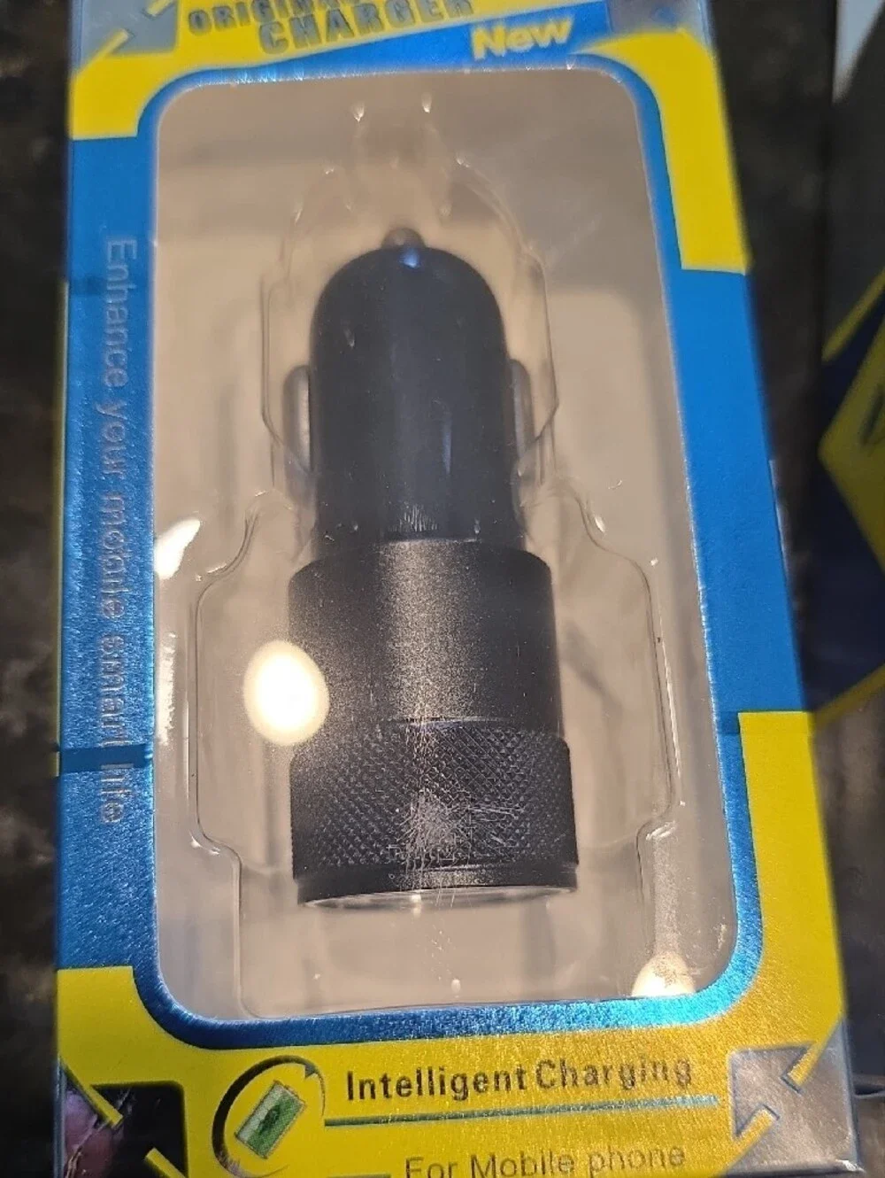 Dual USB Car Charger in Black and White - Reliable Vehicle Charging